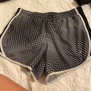 Girls running shorts!! Nike but the logo has faded!